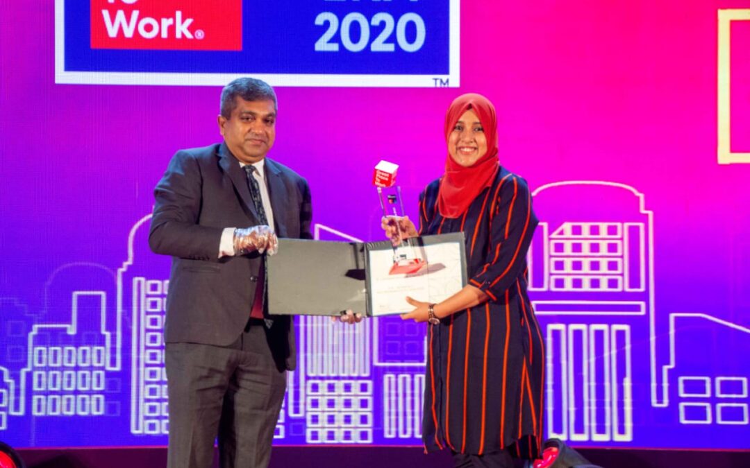 Award received at corporate event.